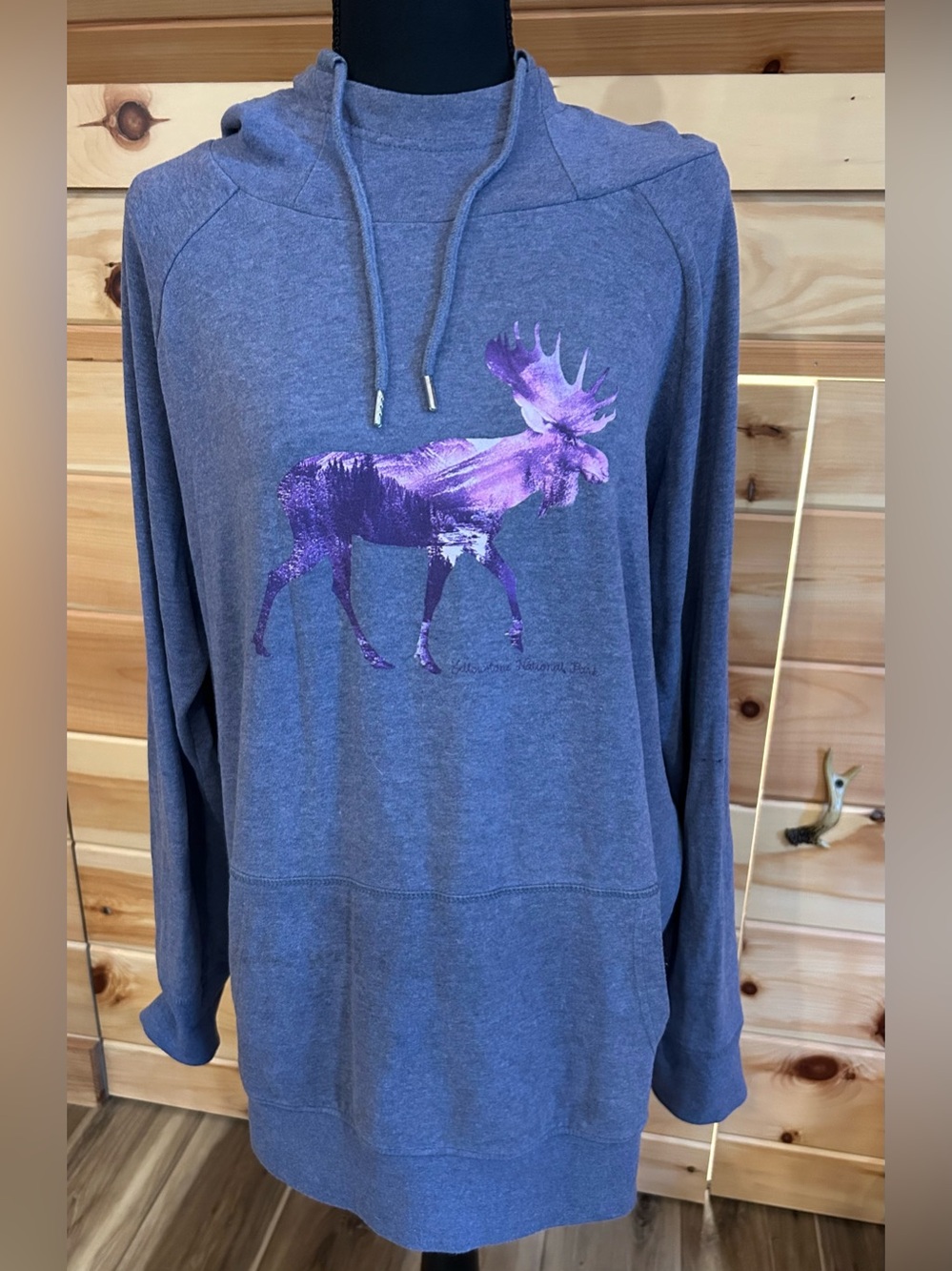 The Duck Company womens in purple hoodie with Moose graphic